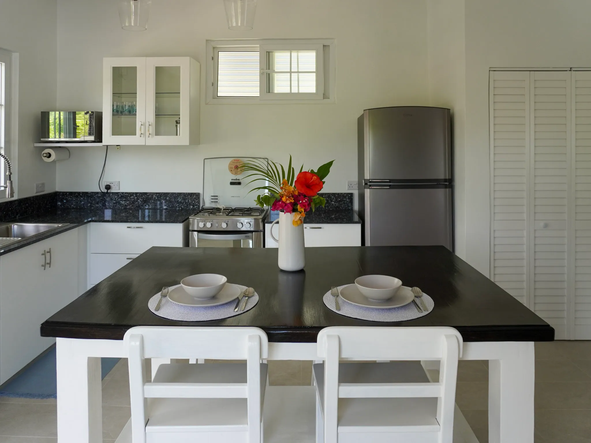 Dining table at The Loft, set for two